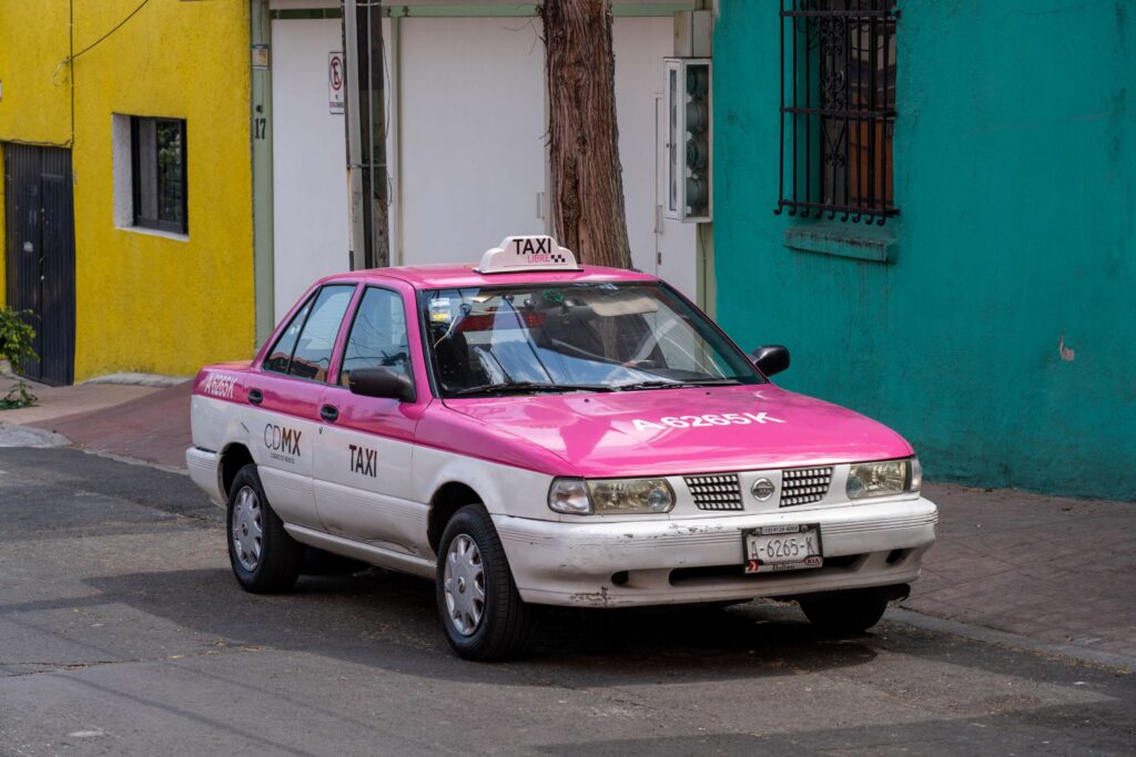 A Pink Taxi Parked in Mexico City